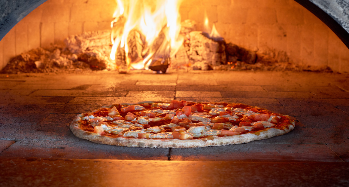 A fresh pizza in the wood burning pizza oven at the Windlass restaurant.