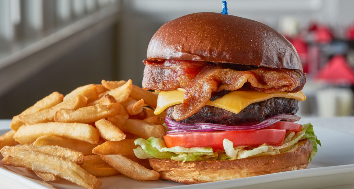 A bacon cheeseburger with the works at the Windlass restaurant.