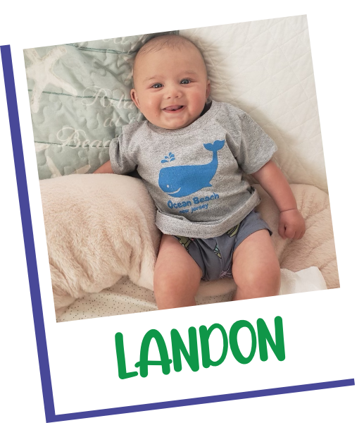Landon in a photo frame wearing a whale shirt